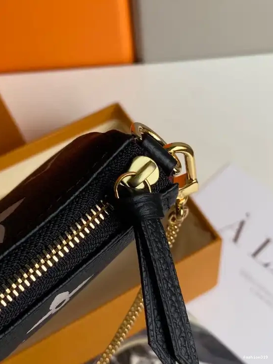 VUITTON POCHETTE ACCESSOIRES LOUIS MINI 0329